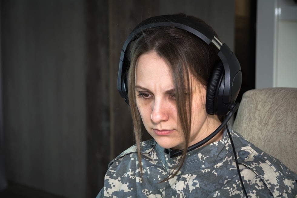 woman in black and grey headphones