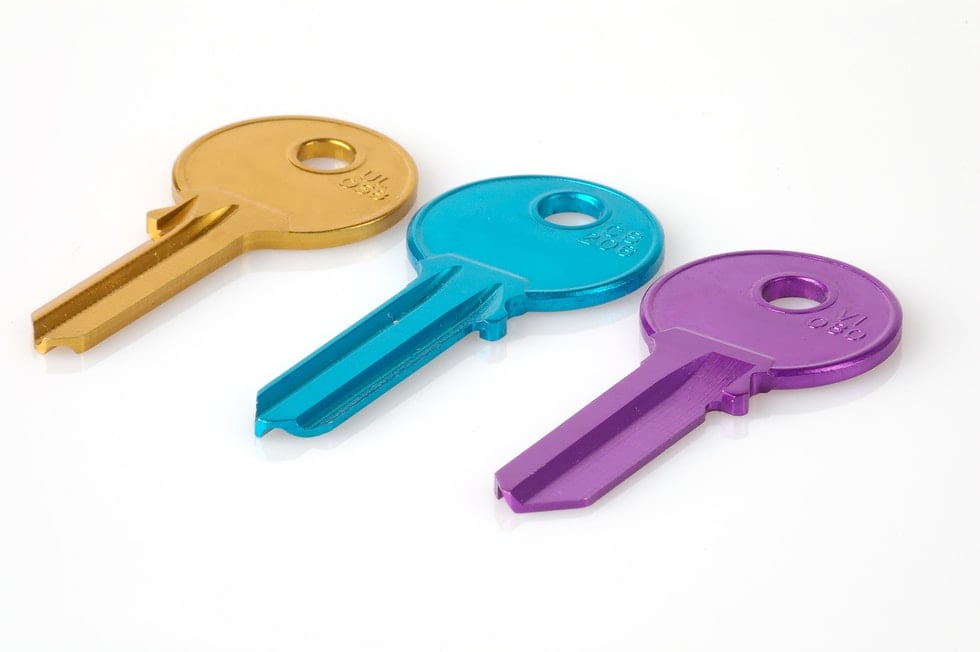 three assorted-color keys